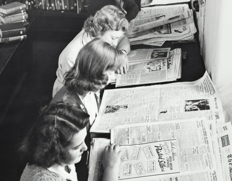 Women Reading a Newspaper